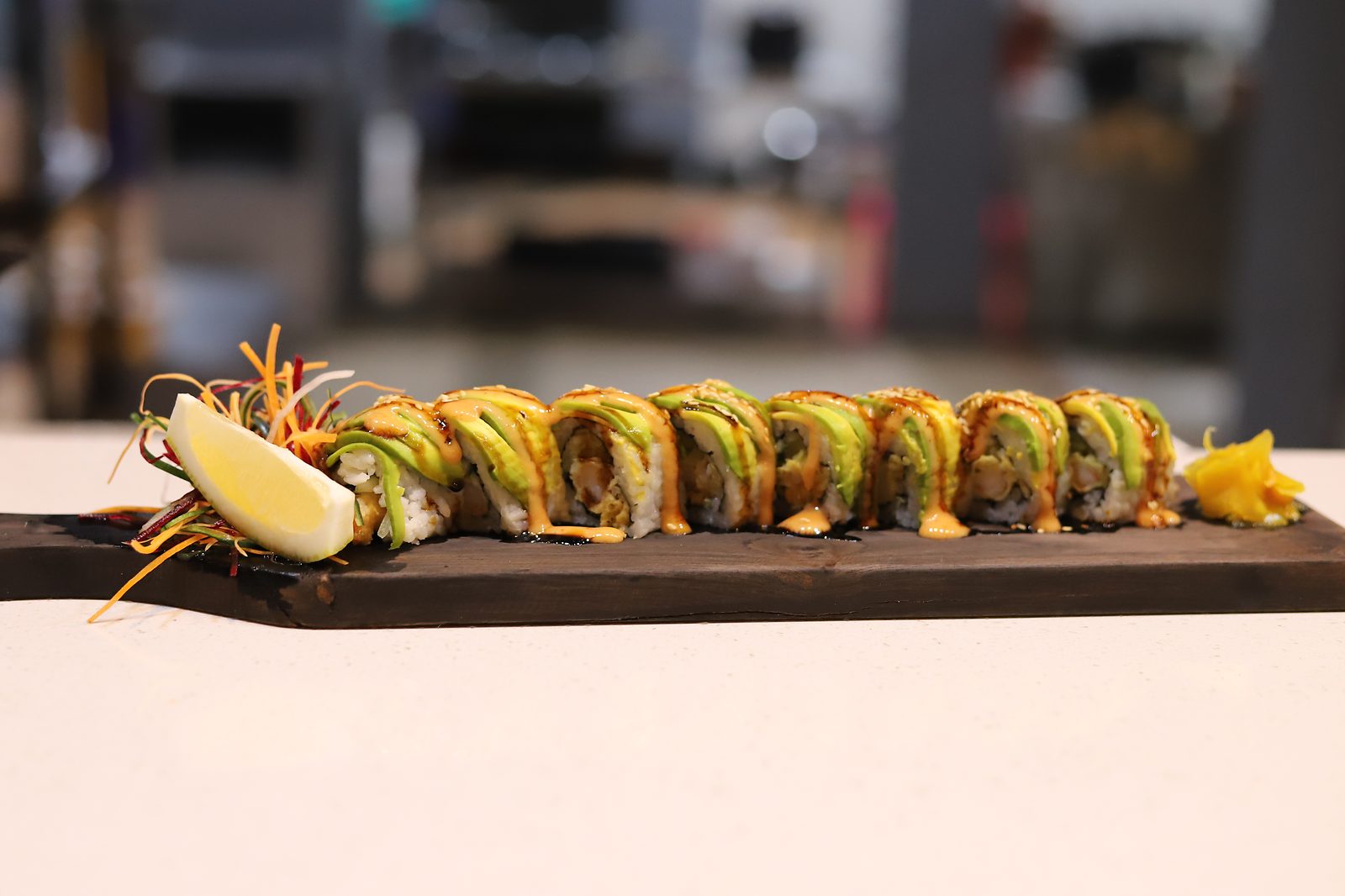 Dragon roll topped with avocado